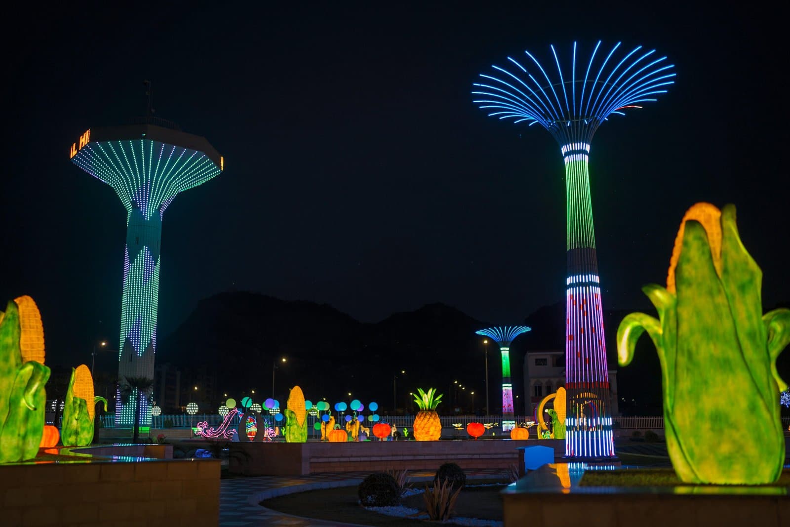 Illuminated sculptures and light trees at Glow Park